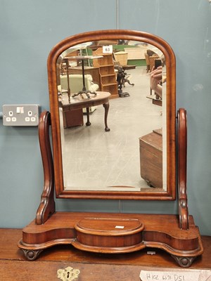 Lot 63 - A 19th century mahogany swing mirror, the...