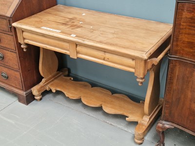 Lot 77 - An antique pine wash stand on baluster...