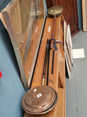 Lot 87 - A copper and a brass bed warming pan