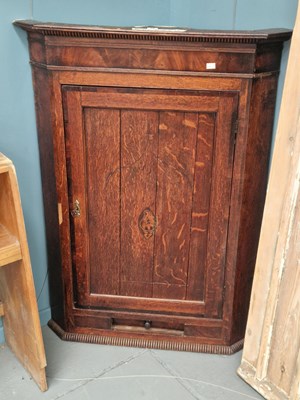 Lot 90 - A Georgian oak and inlaid walnut corner...