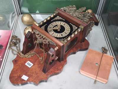 Lot 502 - A Dutch brass weight driven wall clock