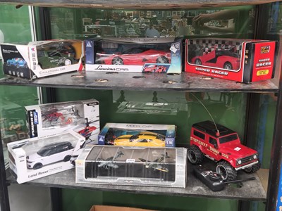 Lot 504 - Seven boxed and loose remote controlled...