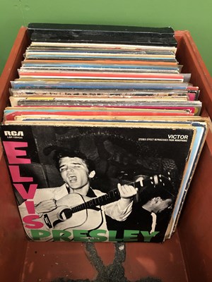 Lot 705 - Elvis Presley: a collection of approximately...