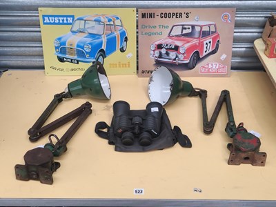 Lot 522 - Two vintage metal signs advertisng the Mini...