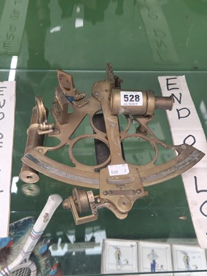 Lot 528 - A sextant with a silvered scale