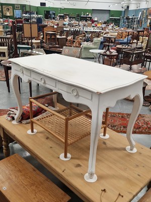 Lot 122 - A white painted mahogany serpentine writing...