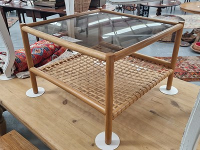 Lot 123 - A mid century bamboo and glass coffee table...