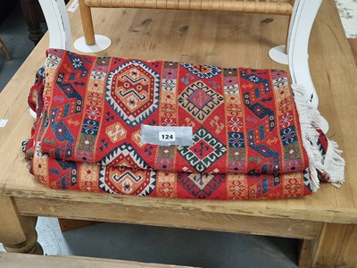 Lot 124 - A colourful fringed woven throw 321 x 175cm