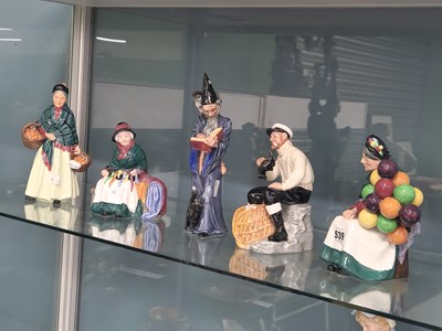 Lot 539 - Four Doulton figures of vendors together with...