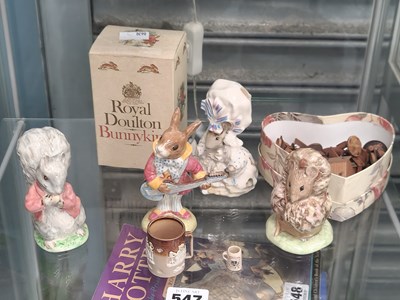 Lot 547 - Four Beatrix Potter figures together with some...
