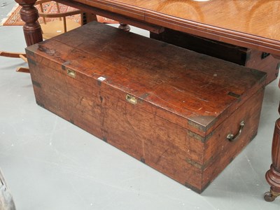 Lot 134 - An antique teak brass bound campaign...