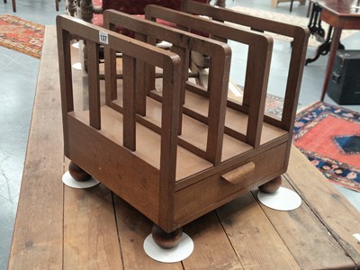 Lot 137 - A Cotswold School oak Canterbury, the three...