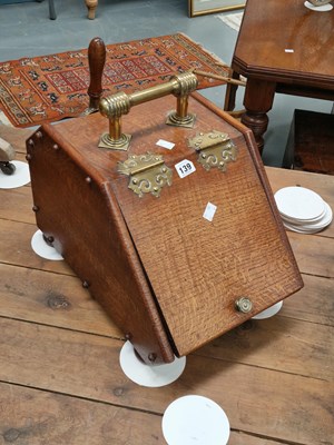 Lot 139 - A Victorian oak and brass coal box and shovel