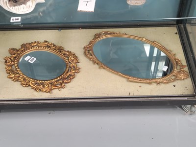 Lot 562 - Two gilt framed oval mirrors