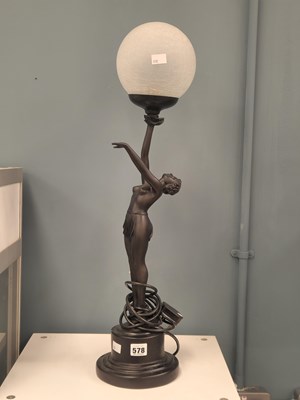 Lot 578 - An Art Deco figural table lamp of a nearly...