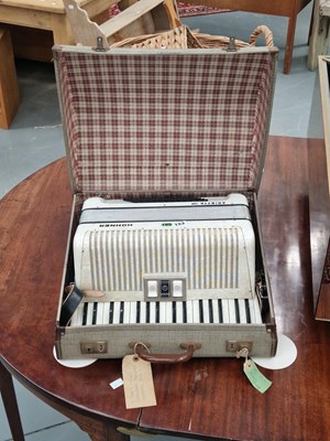 Lot 153 - A vintage cased Hohner Arietta IM bass piano...