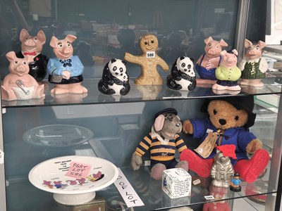 Lot 586 - Six Nat West pig money boxes, a pair of Nat...