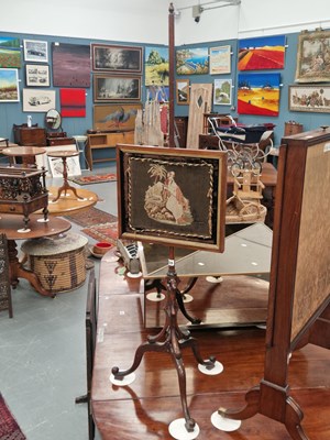 Lot 155 - An antique rosewood pole screen, the tapestry...