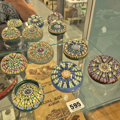 Lot 595 - Six glass millefiore paperweights
