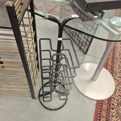 Lot 163 - A modernist wrought metal twelve bottle wine...