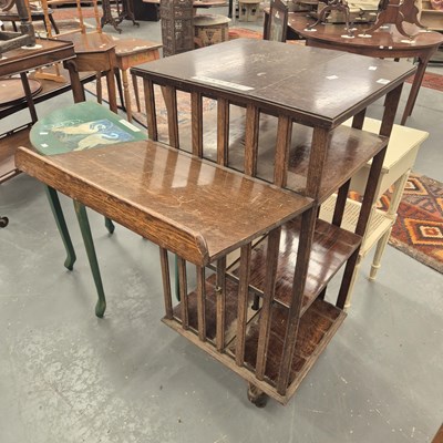 Lot 170 - An antique oak revolving bookcase the six...