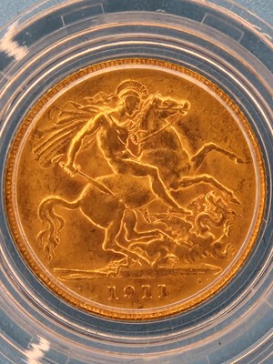 Lot 2812 - A 22ct gold half sovereign dated 1911,...