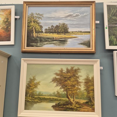 Lot 189 - Two landscapes: a lake vew with figures with a...