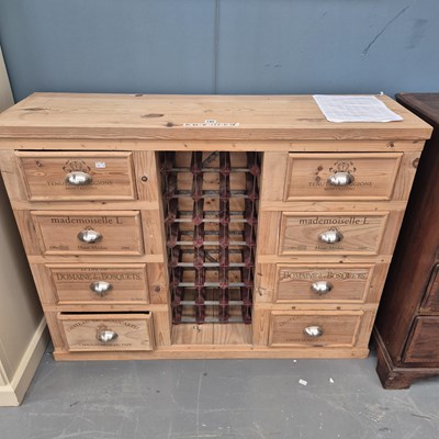 Lot 190 - A modern pine side cabinet, the central twenty-...