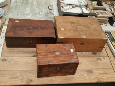 Lot 642 - A mahogany writing slope, a mahogany and an...
