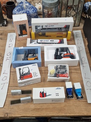 Lot 659 - Boxed die cast fork trucks and lorries by...
