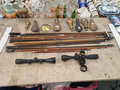 Lot 663 - Seven copper powder flasks, shotgun cleaning...