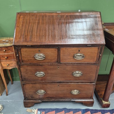 Lot 220 - A small Victorian mahogany bureau of two over...