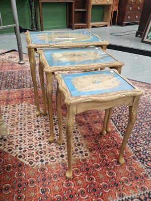 Lot 223 - A nest of three carved serpentine tables, the...