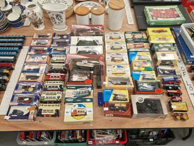 Lot 678 - Boxed and loose die cast trolley buses, vans...