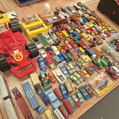Lot 704 - A collection of die cast cars, vans and some...