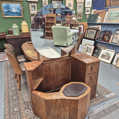 Lot 257 - An Art Deco walnut dressing table, the round...