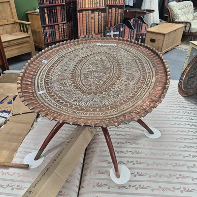 Lot 294 - A large oval Eastern decorated tray on a...