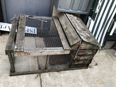 Lot 451 - A rustic wooden hutch for outdoor use H 64 W...