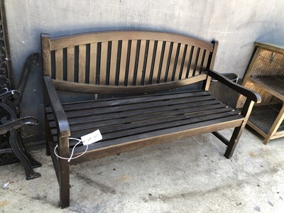 Lot 459 - A solid wooden stained garden bench H 97 W 151...