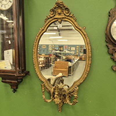 Lot 322 - An antique gilt framed girandole mirror, the...