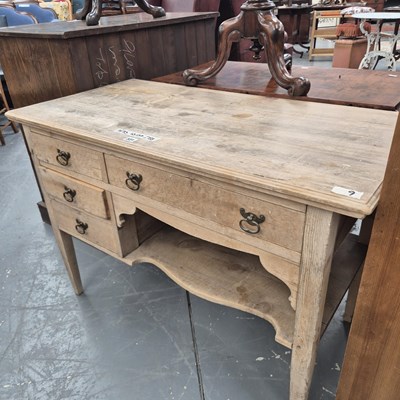 Lot 331 - A  19th century pine side table, the bank of...