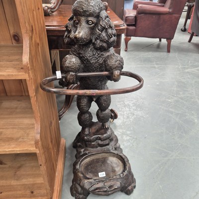 Lot 335 - An American cast metal umbrella stand in the...