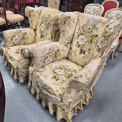 Lot 346 - Two antique wing back chairs in similar floral...
