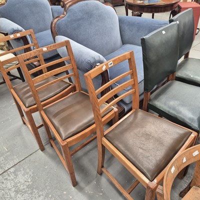 Lot 349 - Three George V oak ladderback chairs with...