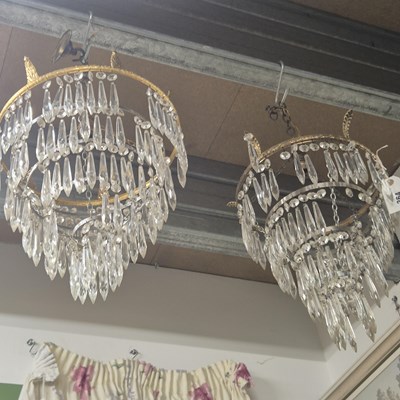 Lot 364 - A near pair of gilt and five tier drop single...