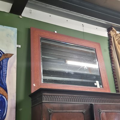 Lot 377 - A modern mirror in a painted and textile inset...