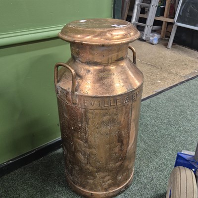 Lot 387 - A metallic painted milk churn named for...