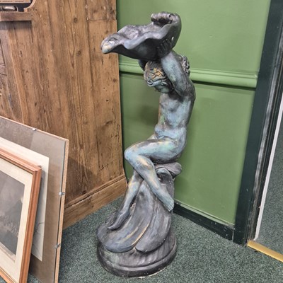 Lot 388 - A pair of ceramic figures holding clam shells,...