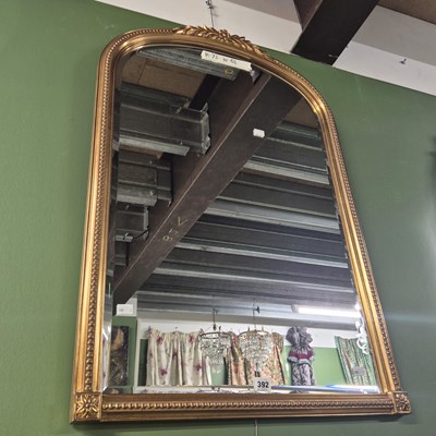 Lot 392 - A gilt framed arch top bevelled mirror  73 × 63cm