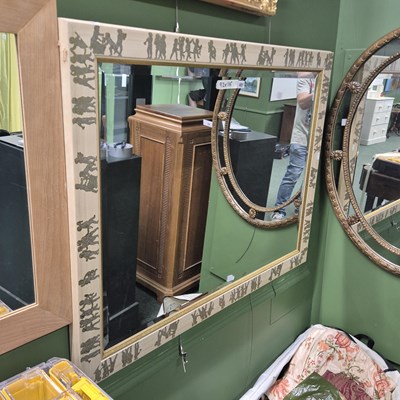 Lot 401 - A modern bevelled mirror decorated with...